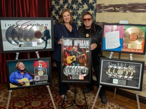 Don McLean is pictured backstage at the Grand Ole Opry with Jackie Jones of the RIAA following McLean's second Opry performance.