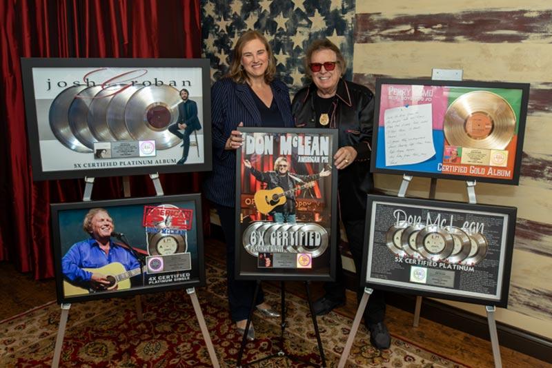 Don McLean is pictured backstage at the Grand Ole Opry with Jackie Jones of the RIAA following McLean's second Opry performance.